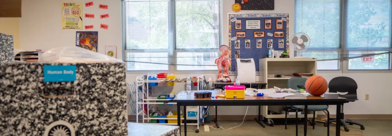 Wingate Elementary School Classroom Table with Various School Items.